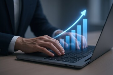Business Growth Visualization: Man Typing on Laptop with Upward Trending Graph Overlay, Representing Success