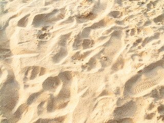 Nature travel background, sand beach close up texture summer desert zen garden coast ocean for vacation, hot tropical scene nature, holiday dune pile dry brown heap