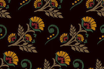 Ikat floral paisley embroidery on black background.Ikat ethnic oriental seamless pattern traditional.Aztec style abstract vector illustration.design for texture,fabric,clothing,wrapping,decoration.