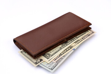 Closeup of a Brown Leather Wallet with US Dollar Bills on White Background.