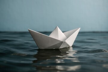 Obraz premium A lone paper boat navigates the calm waters under a serene sky