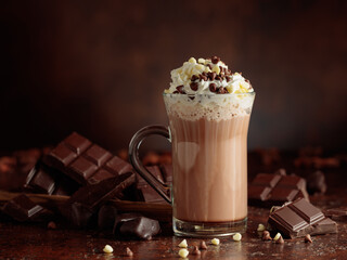 Hot chocolate cocoa drink with whipped cream.