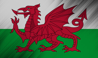 Welsh dragon flag waving proudly in vibrant colors at sunset