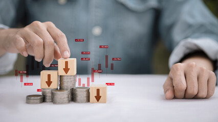 Financial loss and market decline concept with coin stack and red chart