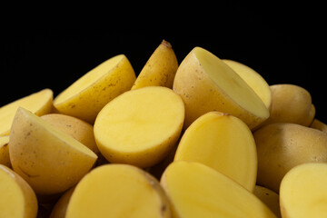 Fresh Raw Potatoes Cut In Half Close-Up Macro View.