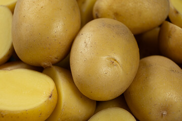 Fresh raw unpeeled potatoes close-up