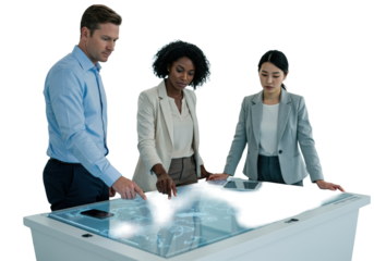 Diverse business professionals collaborate around an interactive digital display table in a modern, bright office, strategizing future growth. Strategic business planning