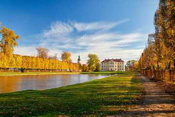 Park with castle behind a pond