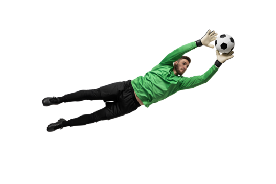 Goalkeeper dives to catch a soccer ball, displaying agility and focus in a dynamic sports action shot, capturing the intensity of a football match