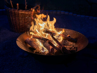 burning wood in a fire bowl