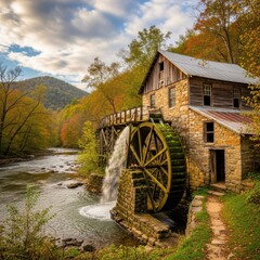 Obraz premium Picturesque Grist Mill in Autumn Landscape with Cascading Water Wheel