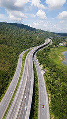Drone shot The M6 motorway Nakhon Ratchasima Province - Bang Pa-in Lam Ta Khong River and Mountain. Motorway Korat Thailand