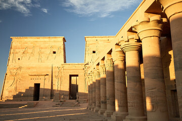 The entrace of the temple of Isis on Philae island with the leading colonade, Egypt, Low dam Aswan