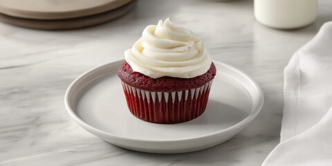 Elegant red velvet cupcake with cream cheese.