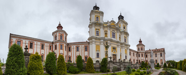 Obraz premium Buildings of former Jesuit College with Transfiguration Basilica, Kremenets, Ukraine