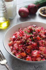 A bowl with Vinegret salad, a typical Russian dish