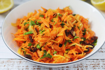 A bowl with traditional Polish carrot salad  © nastyakamysheva