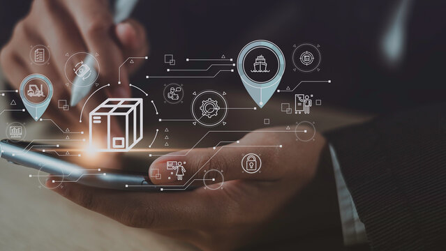 Smart logistics and inventory tracking concept with businessman using mobile device to manage digital supply chain, real-time delivery, shipping status, and secure distribution operations.