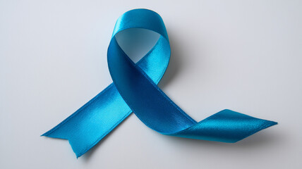 Blue awareness ribbon on white background