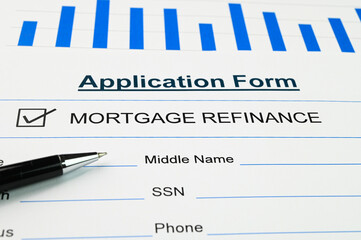 Applying for mortgage refinance using a form.