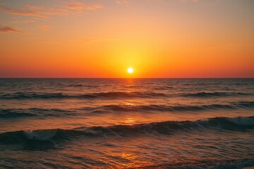 Obraz premium Serene twilight scene featuring a stunning sunset illuminating the peaceful sea