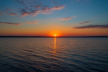 Fototapeta premium Sunset scene at the large water body