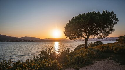 Sunset view from a quiet island in a gentle sea bay