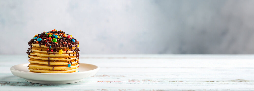 Kue Cubit Miniature Indonesian Pancakes with Chocolate Sprinkles. Traditional Indonesian Dessert