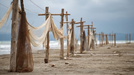 Fishing nets drying on wooden posts