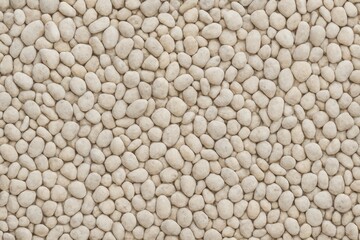 Gentle light stone surface as background texture