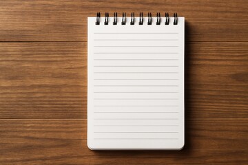 Spiral-bound notebook placed on a wooden table