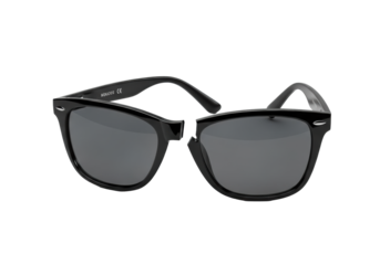 Contemporary glossy black plastic sunglasses snapped at bridge, split, lenses in halves, on smooth transparent studio background, bright shadowless light, concept of product defect