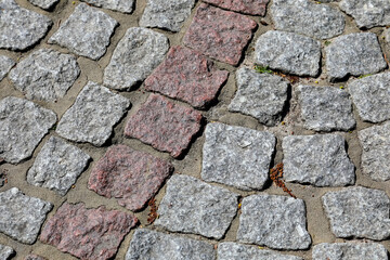 Obraz premium The cobblestone pavement in the town of Mielno, Poland