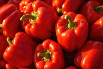 Macro image of vibrant red peppers basking in sunlight
