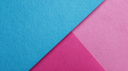 Fototapeta premium Abstract image featuring two angled pastel-colored textured surfaces, a vibrant pink and a lighter blue, meeting in a sharp diagonal line