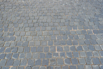 Fototapeta premium Paving stones on floor in parking lot,Concept of laying paving slabs and pavers,Textured concrete for gray floors,Concrete pavement blocks,space for text.