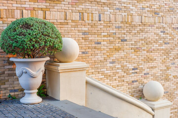 Stairs in the city,Granite stairs and red brick wall,Stone stairway Modern,concrete stairs outside,Empty modern building composition.