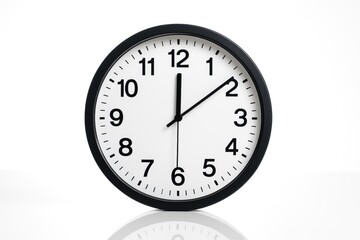 Reflective clock showing 2:00 against a plain white backdrop
