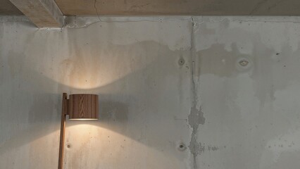 Obraz premium Stylish wood lamp featured on a cement wall, perfect for office or residential interior design. Use of plywood furniture concept.