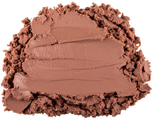 A textured swatch of smudged and crumbled brown cosmetic clay mask or foundation.
