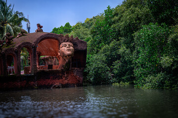 Traditional mud Sculpture by the Riverside in Goa, India