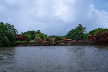 Traditional mud Sculpture by the Riverside in Goa, India