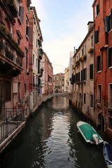 Morning view of the old town, canal and old bridge in the San Marco district of Venice, Italy