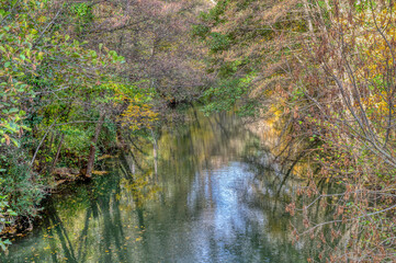 VIEW OF NATURE AND LANDSCAPE GENERATED BY THE ARGA RIVER AS IT PASSES THROUGH HUARTE, PAMPLONA, NAVARRA, SPAIN