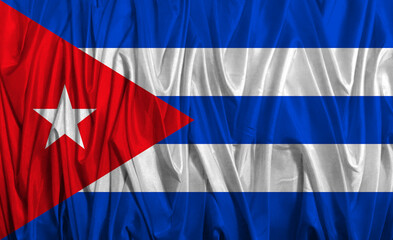 Cuban flag waving proudly under a bright blue sky