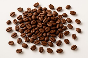 Close-up of roasted coffee beans arranged on a white background
