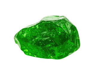 Fototapeta premium A single rough uncut emeraldgreen gemstone with a glossy crystalline texture and internal specks.