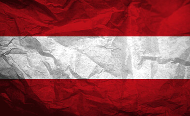 Waving flag of Austria crafted from textured, crumpled paper