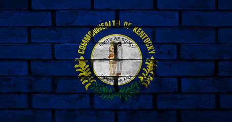 Kentucky flag painted on a brick wall with vibrant colors and textures