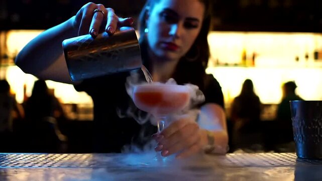Crafting a smoky cocktail with flair, perfect for nightlife and mixology enthusiasts at lively bars.